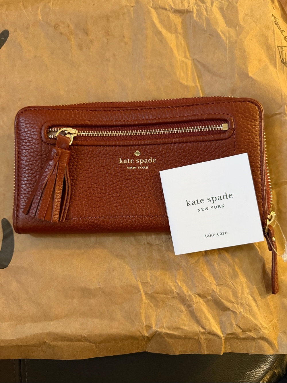 kate spade pebbled leather zip wallet with tassel NWOT